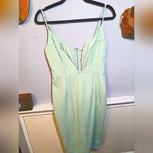 Mint green pleather bodycon style dress with plunging neckline reinforced bust